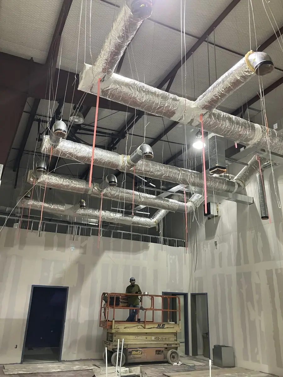Ductwork being installed in a new building